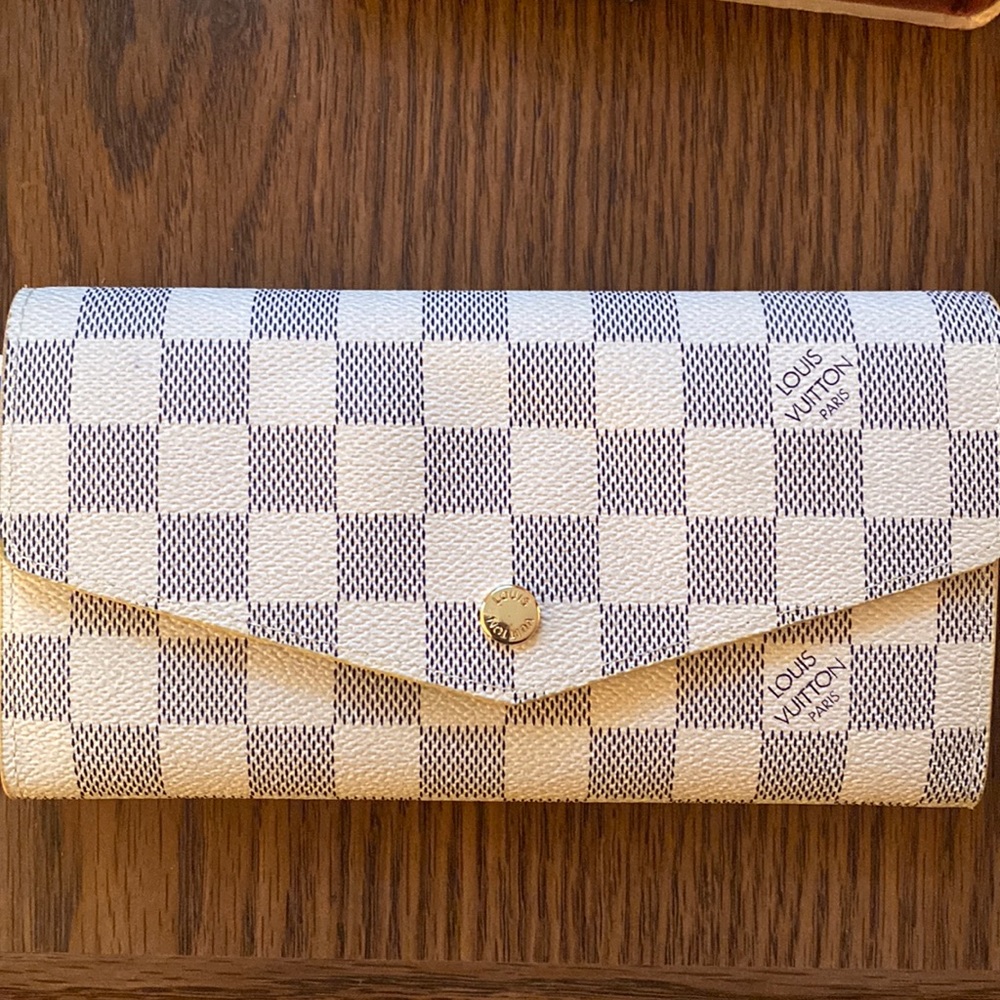 LV wallet - only reason I’m selling it for low cost is because I was gifted two